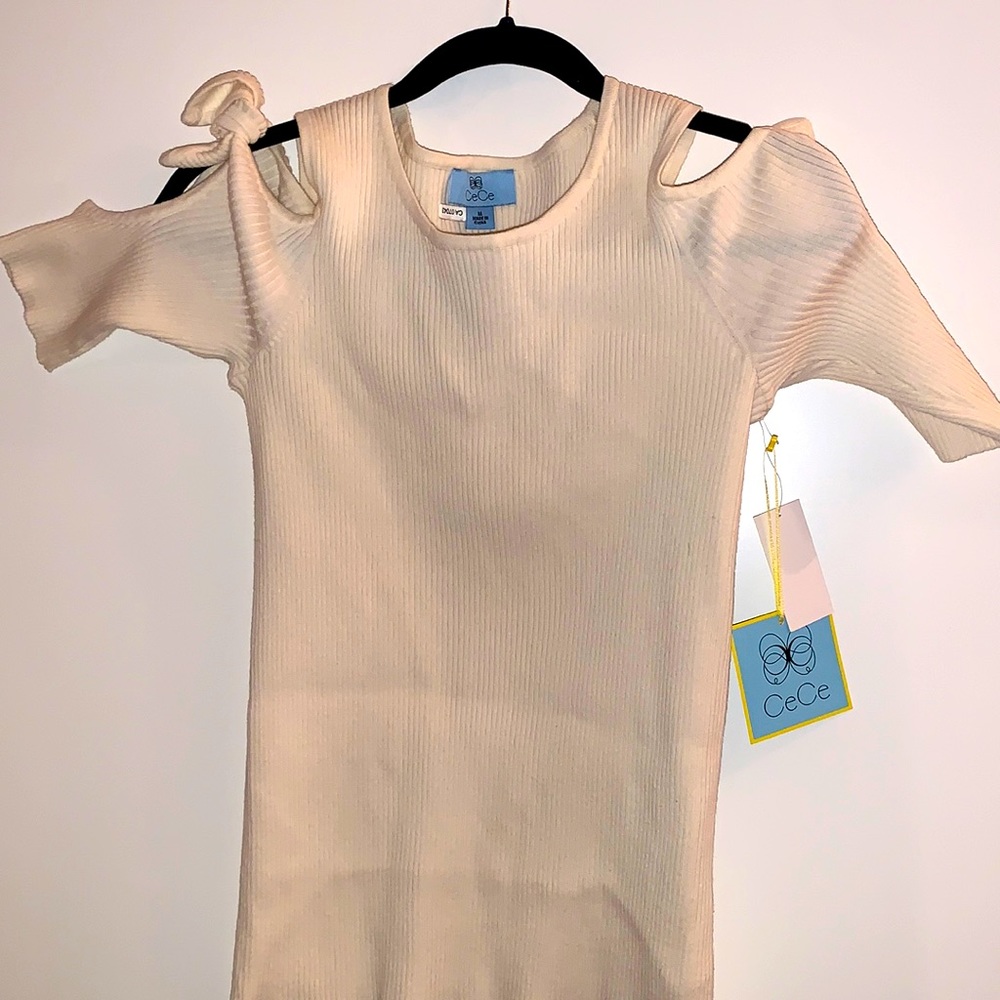CeCe ribbed shirt peekaboo shoulder with tie knot detail on shoulders